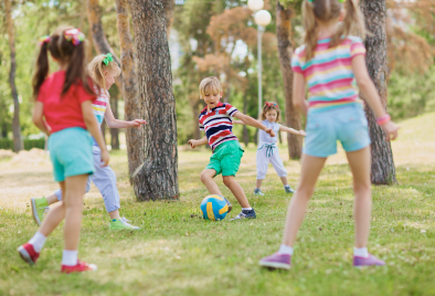  Kids playing soccer at a summer camp
